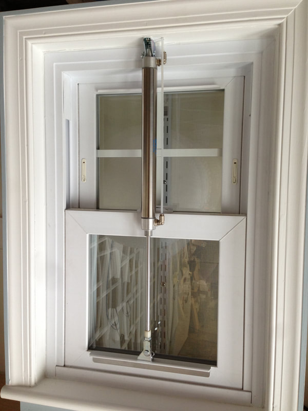 Double hung windows made automatic with pneumatic operation.
